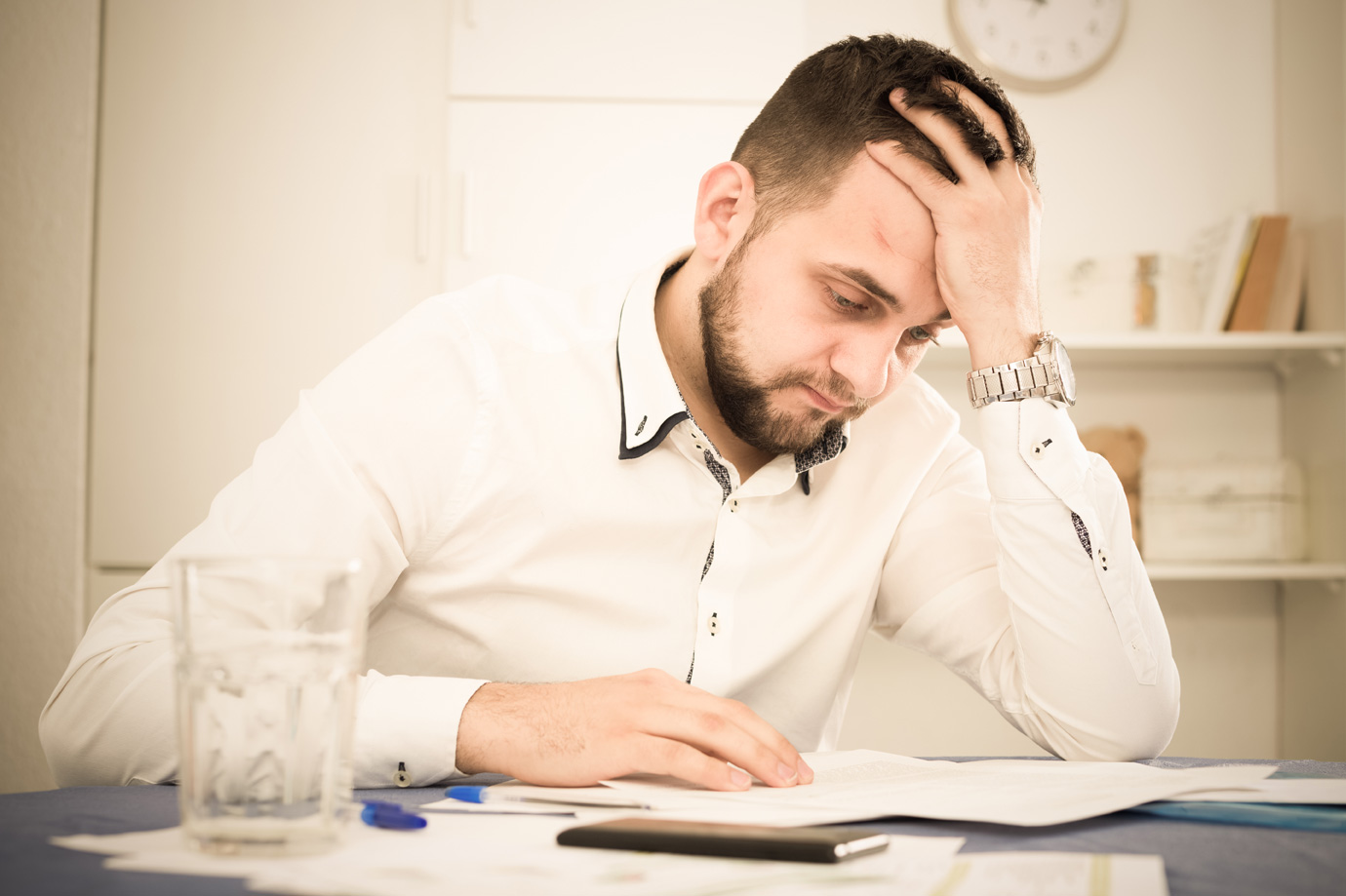 Young distressed man having no possibility to pay utility bills and rent